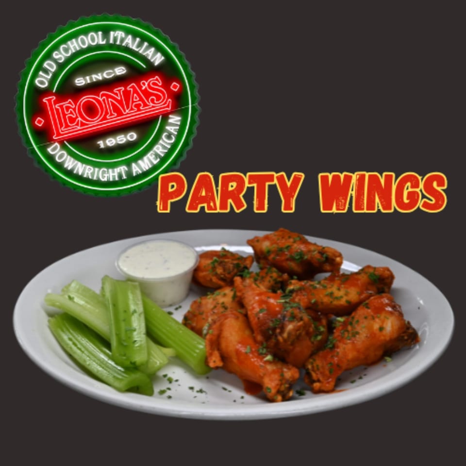Leona's Pizzeria Party Wings with celery sticks and ranch dressing on a white plate.