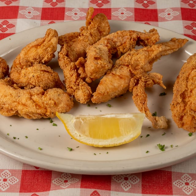 Famous Hand Breaded Jumbo Chicken Tenders.